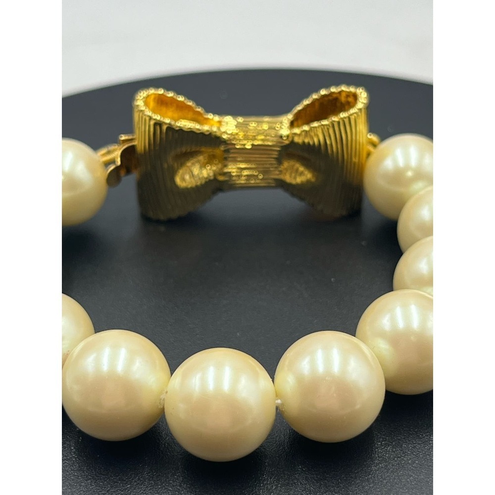 Kate Spade All Wrapped Up Pearl Gold Bow Bracelet - Picture 8 of 13